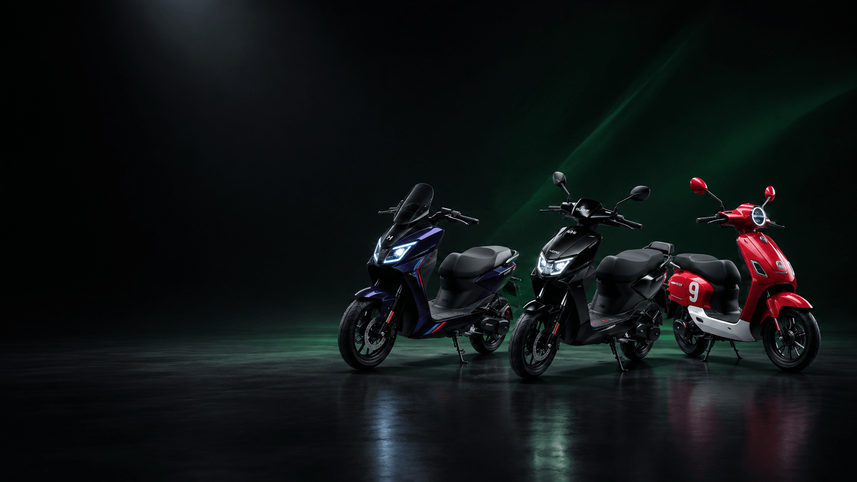 The EV World showroom lineup — three electric scooters lit in a dark studio